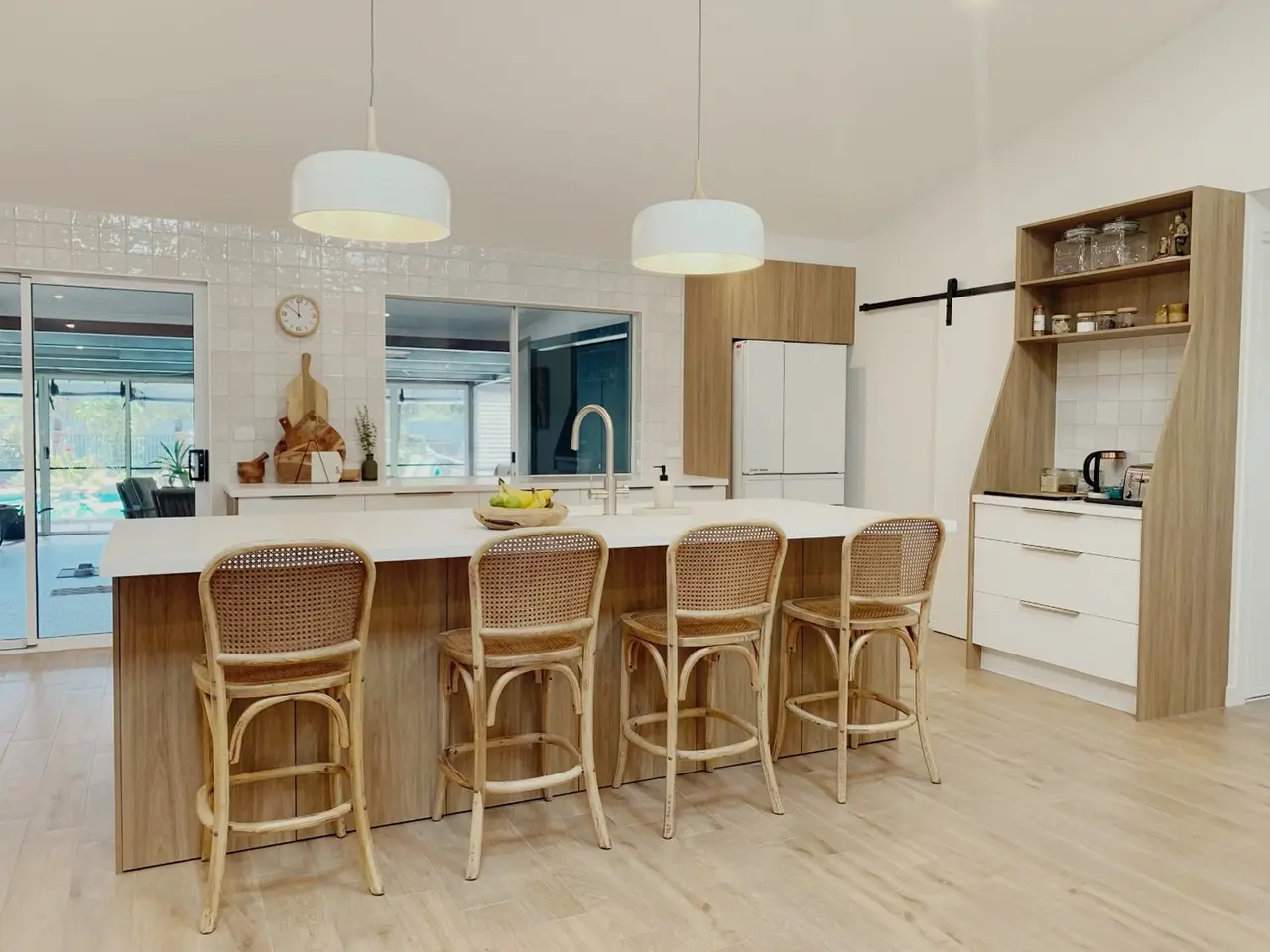 Renovated kitchen with an island bench and pendant lighting